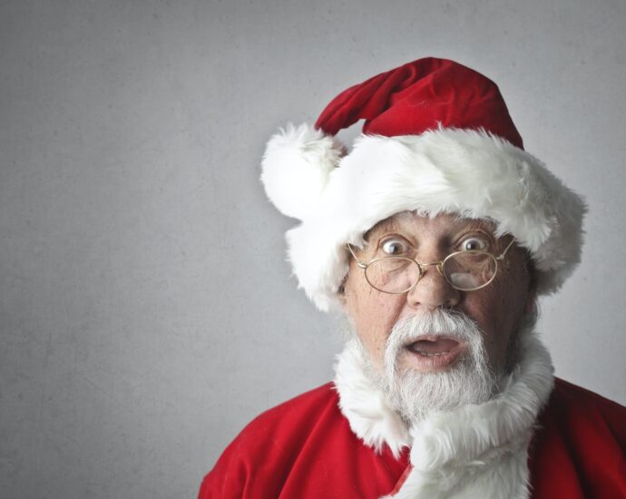 man in santa claus costume