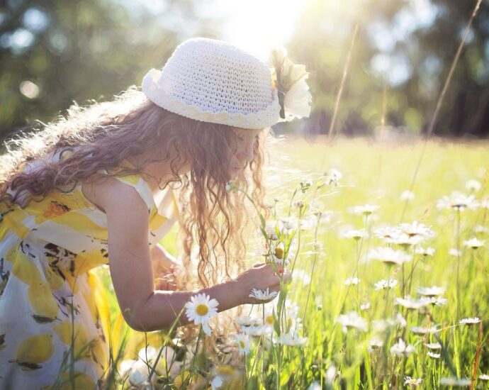 girl picking flowers