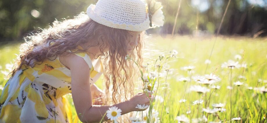 girl picking flowers