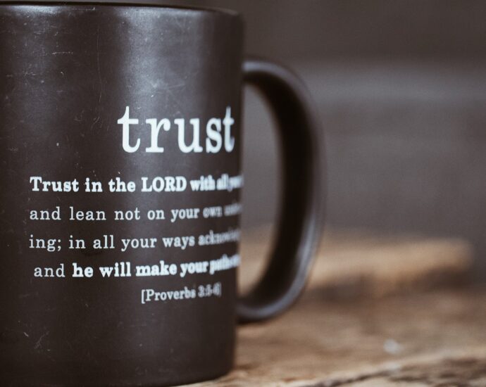 black mug with proverb from holy bible