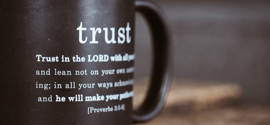 black mug with proverb from holy bible