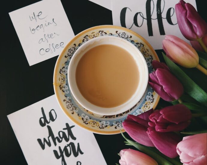 flat lay photography of cup filled with coffee