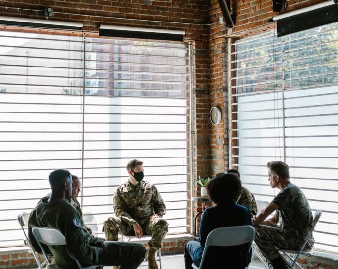 photo of people talking to one another