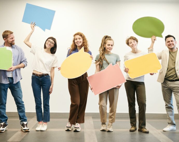 people standing near white wall