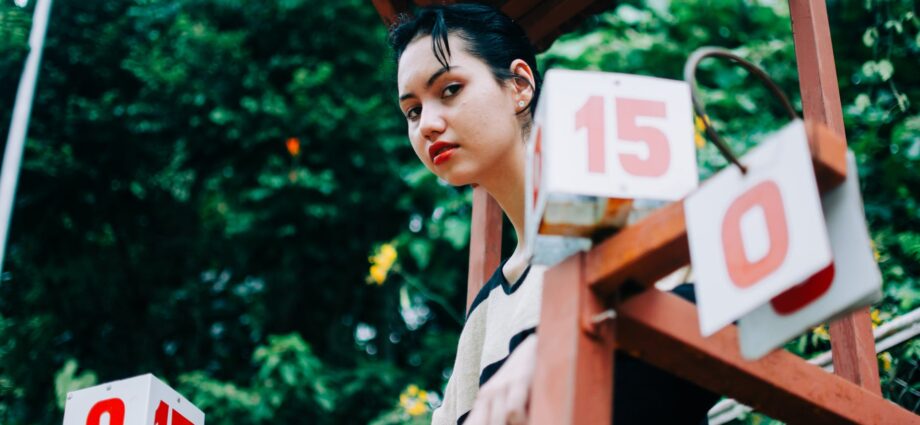 young woman on wooden chair for judge