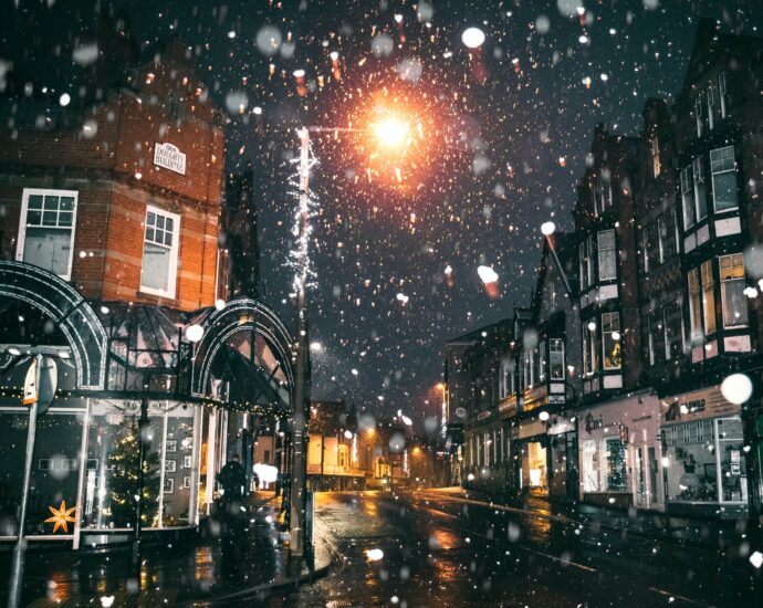 rain of snow in town painting