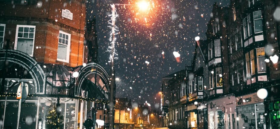 rain of snow in town painting