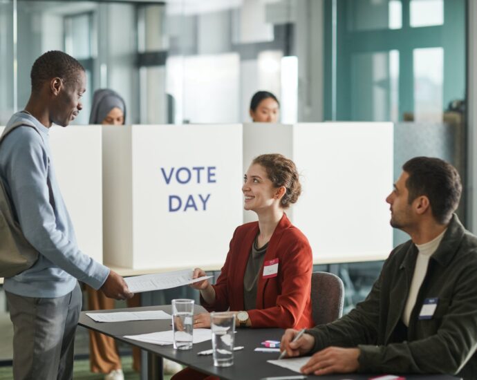 people inside a voting center