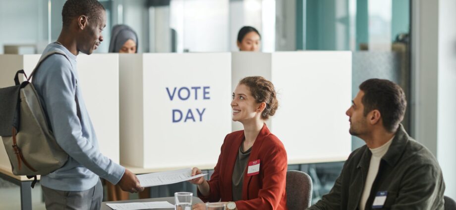 people inside a voting center