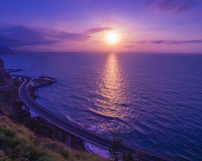 body of water across sunset
