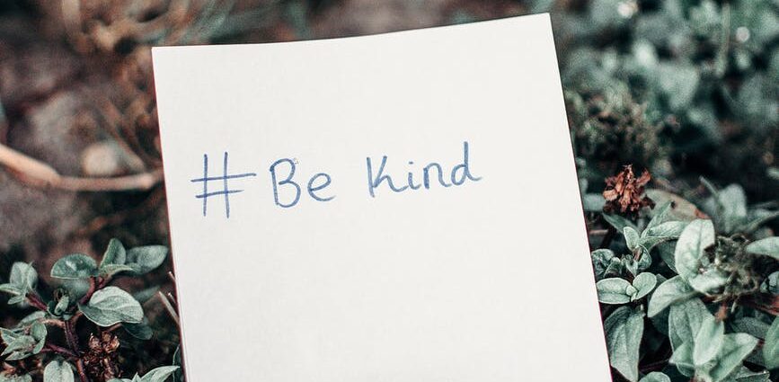 white printer paper with be kind text on plants